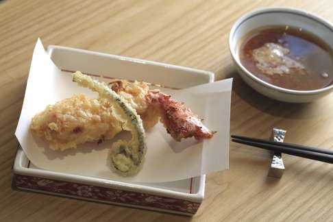 Tempura of king crab and fiddlehead fern.