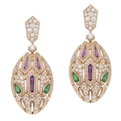 Bulgari. Embracing the house’s most significant motif, the Serpenti Seduttori earrings in pink gold adopt a new shape of the snake’s head to accentuate the power of the emeralds-set eyes. Price on request