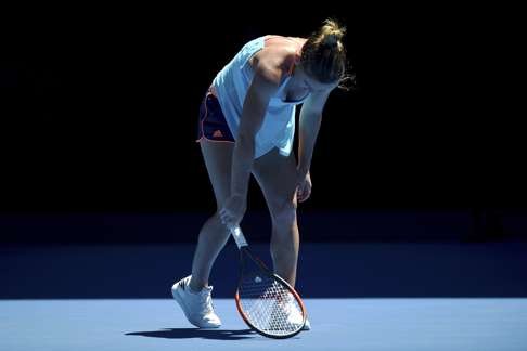 Simona Halep of Romania was a surprise casualty on day one. Photo: EPA