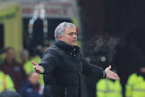 Jose Mourinho gestures from the touchline during the draw at Stoke. Photo: AFP