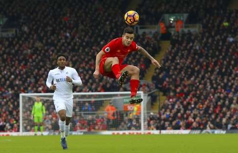Philippe Coutinho in action Swansea at Anfield. Photo: AP