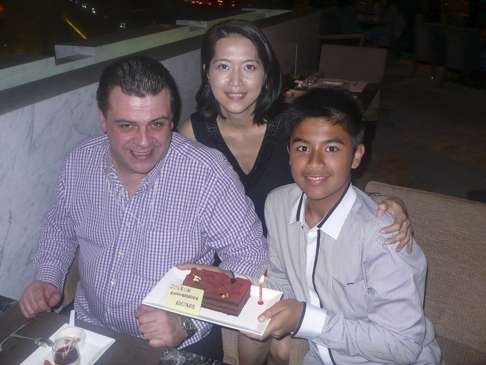 Pascal Breant, his wife Jackie Chan and son Nicolas celebrate the latter’s 14th birthday in 2012.