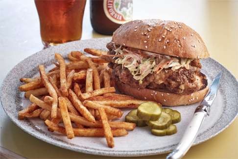 Southern fried chicken sandwich with seasoned fries.