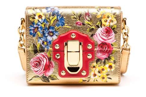 Dolce & Gabbana. The house continues its richly embellished looks by pairing elaborate floral print with vibrant colours for this golden bag, HK$14,900