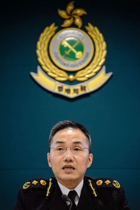 Roy Tang, Customs and Excise commissioner, answers media questions regarding the Singapore armoured troop carriers impounded in Hong Kong, on January 25. Photo: AFP
