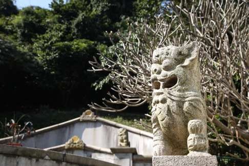 A traditional Chinese lion statue in front of the Hotung grave at Chiu Yuen Eurasian cemetery. Photo: James Wendlinger
