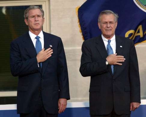 Then US president George W. Bush and defence secretary Donald Rumsfeld at a ceremony marking one year since the terrorist attacks of September 11, 2001, at the Pentagon in Washington. Rumsfeld stepped down in November 2006 after the Republicans lost heavily in mid-term Congress elections over opposition to the Iraq war. Photo: AP