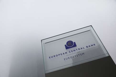 A euro currency symbol sits on a sign as the European Central Bank (ECB) headquarter in Frankfurt. Photo: Bloomberg