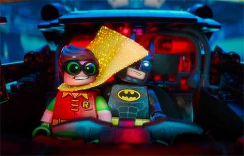 Robin (voiced by Michael Cera) and Batman in a screen grab from The Lego Batman Movie.
