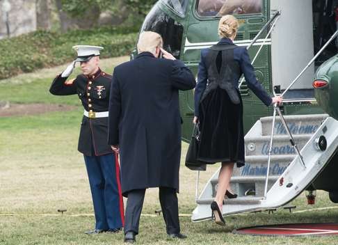 Donald Trump and his daughter Ivanka board Marine One at the White House to fly to Dover Air Force Base for the arrival of the remains of a US commando killed in Yemen during a raid on al-Qaeda. Photo: AFP