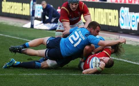 Wales’ Liam Williams in action against Italy’s Giorgio Bronzini. Photo: Reuters