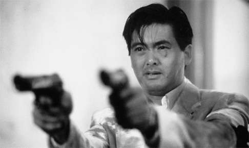 Chow Yun-fat in The Killer directed by John Woo (1989).