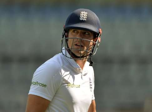 Alastair Cook walks back to the pavillion after his dismissal on the first day of the fourth Test match between India and England. Photo: AFP