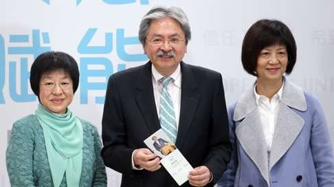 Tsang with his secretary Rebecca Lai (left) and adviser Lee Suk- yee (right) on Monday. Photo: Sam Tsang