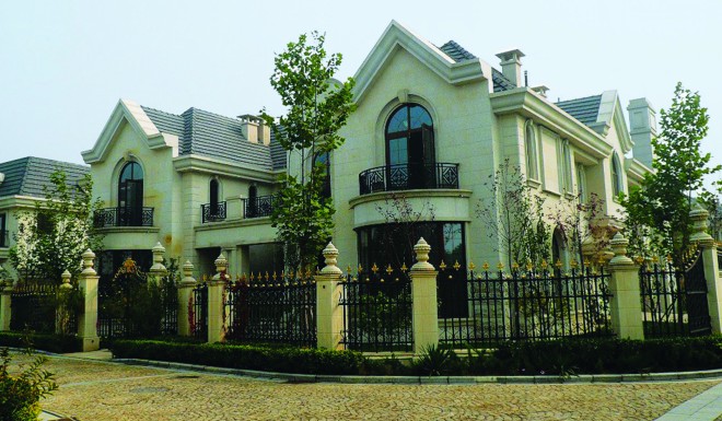 The gargantuan villas at Beijing’s Palais de Fortune development have been built with materials imported from France and have each been named after prized symbols of French culture, from “Louvre” to “Versailles.” Photo credit: Bianca Bosker