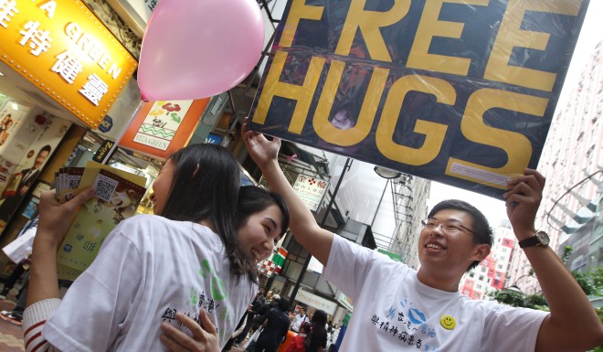 Medical students from the University of Hong Kong stage a campaign to promote mental health awareness in Causeway Bay. Photo: Sam Tsang/SCMP