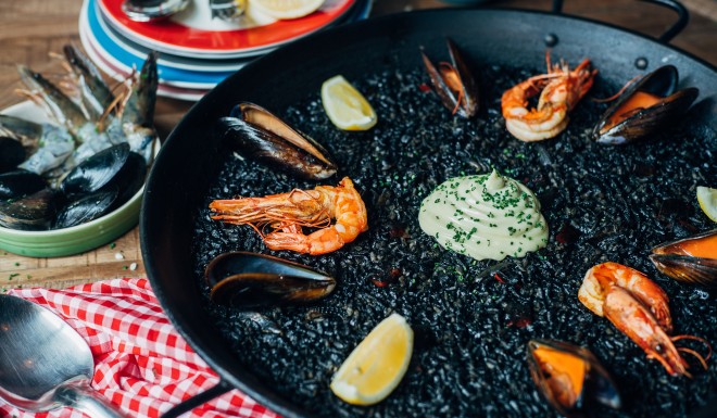 Squid ink and prawn paella at La Paloma