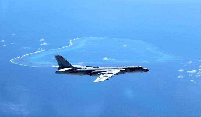 A Chinese H-6K bomber patrols the islands and reefs in the South China Sea. File photo: Xinhua