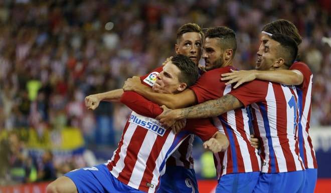 Dalian Wanda Group has a stake in Spanish club Atletico Madrid. Photo: AP