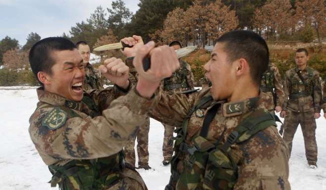 In this file photo from March 2015, soldiers train in Heihe in northeastern Heilongjiang province. Photo: AP