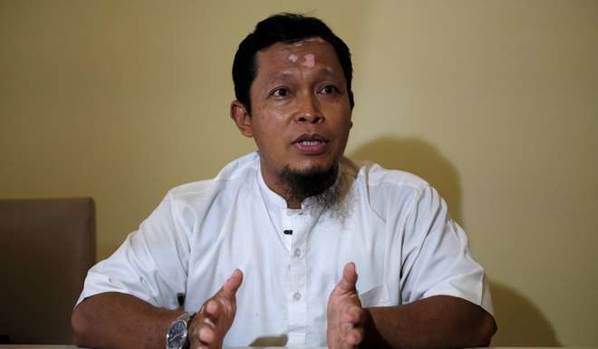 Agus Junaedi, who took over the vigilante wing of Team Hisbah after the death of its founder Sigit in 2011. Photo: Reuters