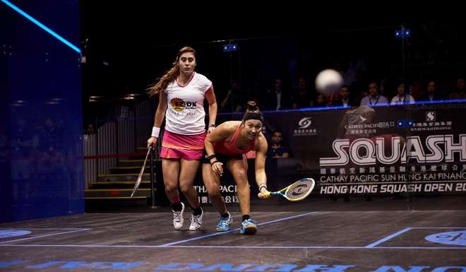 Amanda Sobhy of the United States controls the ball against Nour El Sherbini of Egypt.
