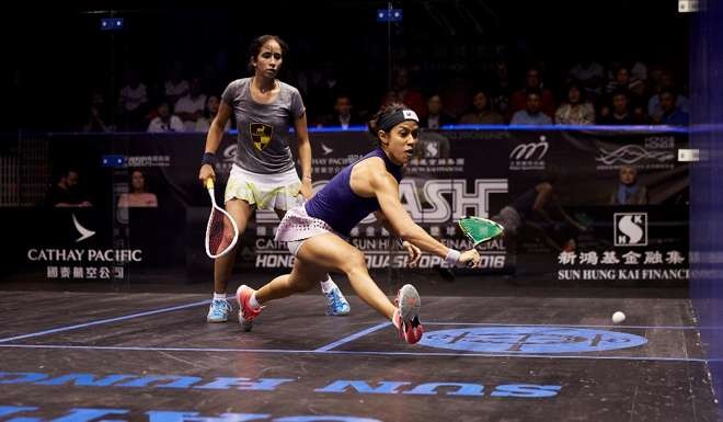 Malaysia’s Nicol David reaches for the ball against Nouran Gohar of Egypt.