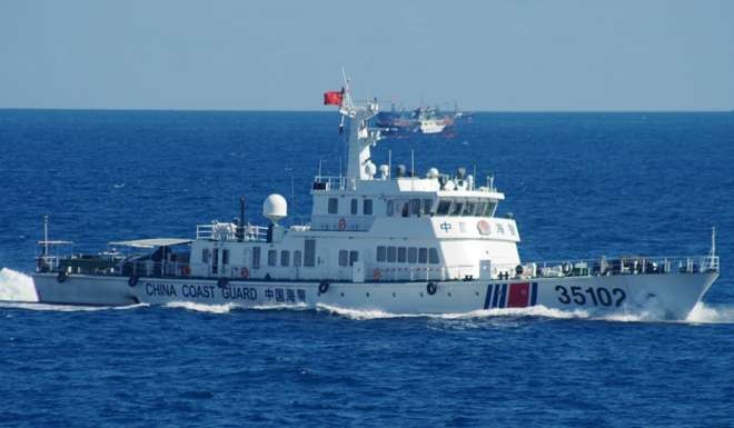 A Chinese coast guard vessel sails near disputed East China Sea islands in August 2016. Photo: AP