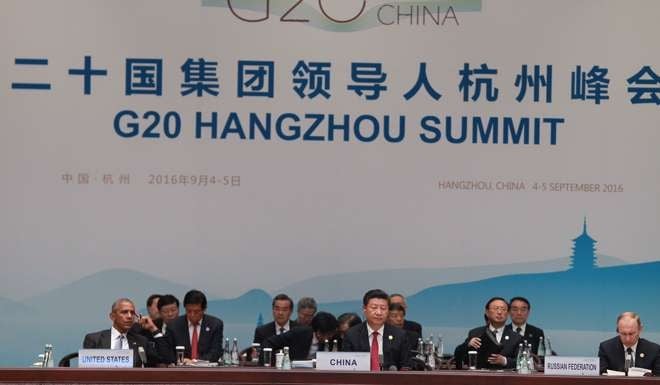 US President Barack Obama, Chinese President Xi Jinping and Russian President Vladimir Putin at the G20 summit in Hangzhou on Sunday. Photo: Simon Song