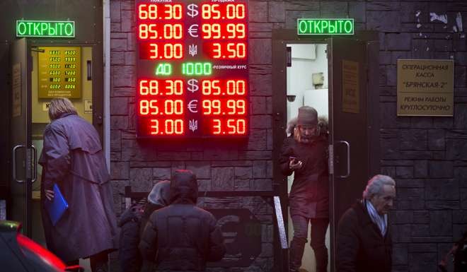 The loans are mostly fixed in yuan or roubles, rather than in dollars, so the two sides may avoid currency volatilities. Photo: AP