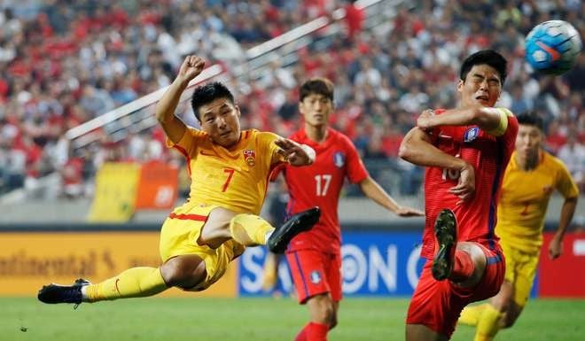 Wu Lei of China in action against South Korea, where China launched a late but unsuccessful bid for a draw. Photo: Reuters
