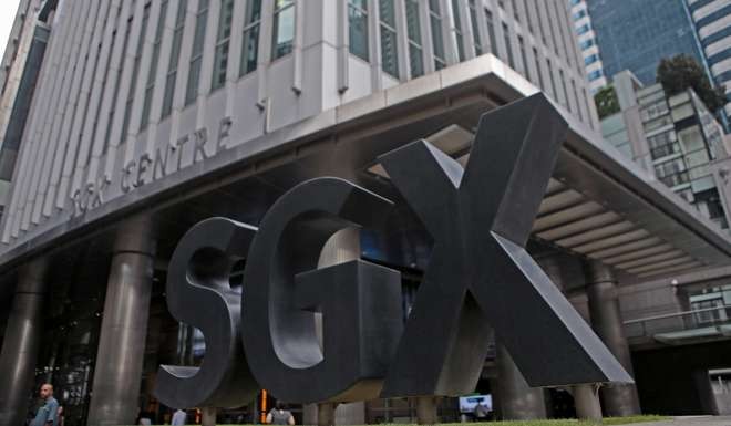 Turnover on Singapore’s stock exchange is less than a tenth of Hong Kong’s and steadily declining further. Photo: EPA