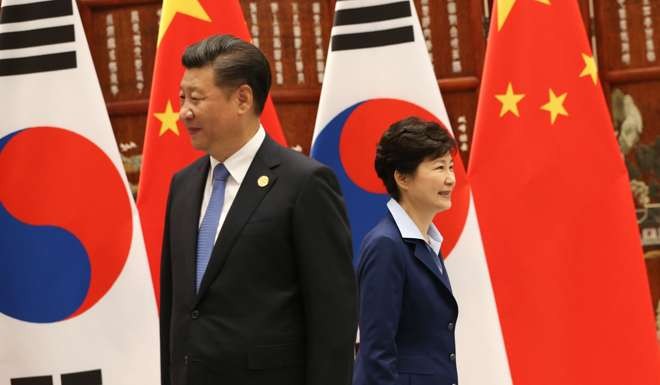 President Xi Jinping and South Korean President Park Geun-hye prepare to meet on the sidelines of the G20 summit in Hangzhou on September 5, when Xi is reported to have reiterated Beijing’s opposition to South Korea hosting the US military's THAAD missile defence system. Photo: EPA