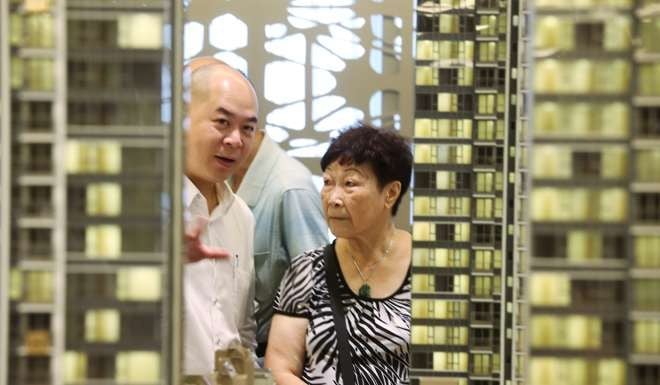 More than 1,100 units in three projects worth an estimated HK$8 billion were sold on the weekend. Photo: Dickson Lee