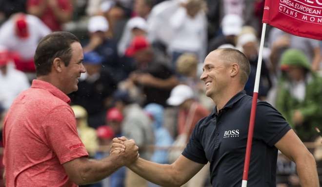 Scott Hend (left) and Alex Noren after the final round of the Omega European Masters in Crans-sur-Sierre, Switzerland. Photo: EPA