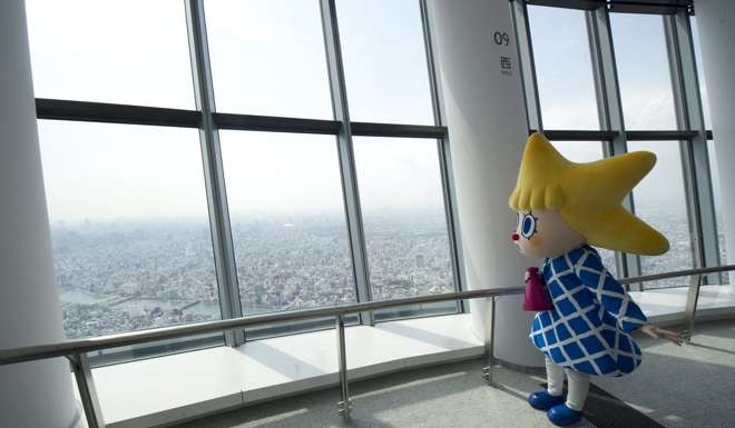 The Tokyo Sky Tree main mascot character, poses at the observatory of the Tokyo Sky Tree. Photo: EPA