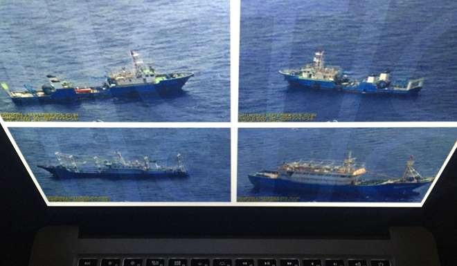 The Philippine government has released what it says are surveillance pictures of Chinese coastguard ships and barges at the disputed Scarborough Shoal in the South China Sea just hours before Chinese Premier Li Keqiang attended the Asean summit. Photo: AP