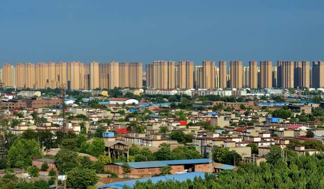Residential buildings in Handan, Hebei province. The pace of home price growth in China’s biggest cities showed signs of easing in July, indicating the key growth driver is losing steam but also offering relief to policymakers worried about a property bubble. Photo: Xinhua
