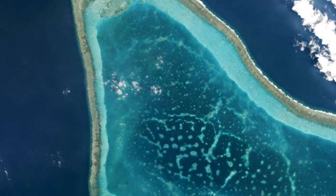 A handout photo shows boats at Scarborough Shoal on March 12. The US navy reported Chinese activity around the shoal, in the northern part of the disputed Spratly Islands. Photo: Reuters