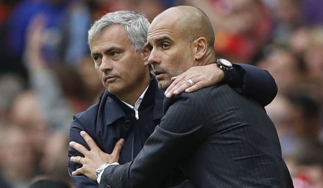 Manchester United manager Jose Mourinho (left) and Manchester City manager Pep Guardiola. Photo: Reuters