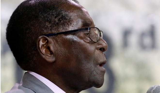 Zimbabwe's President Robert Mugabe addresses the decision making body of his ruling ZANU PF party in Harare, on Friday. Photo: Reuters