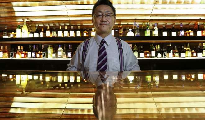 Hidetsugu Ueno at the MO Bar in Hong Kong. “I’m super weak with alcohol,” he says. Photo: Chen Xiaomei