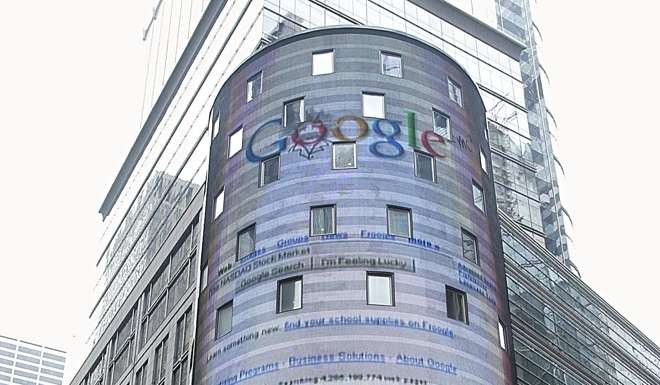 The Google logo is displayed on a giant screen outside the Nasdaq Market Site studios in New York's Times Square after trading started. Photo: AFP