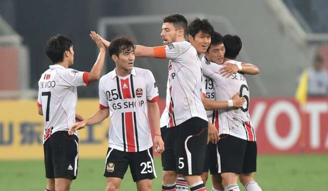 FC Seoul celebrate after they reach the semi-finals. Photo: Xinhua