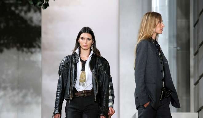 Model Kendall Jenner presents a Ralph Lauren creation. Photo: Reuters