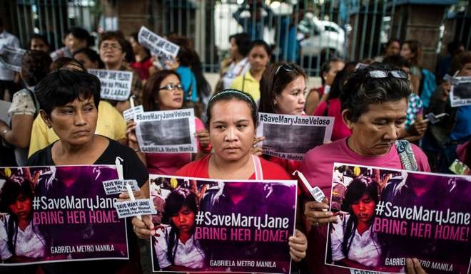 Women's rights activists in Manila urge clemency for Filipina drug convict Mary Jane Veloso who is facing execution in Indonesia. Photo: AFP