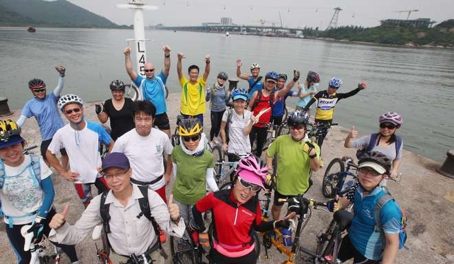 Members of the microadventure group strike a pose at Ma Wan Chung village, Tung Chung. Photo: David Wong