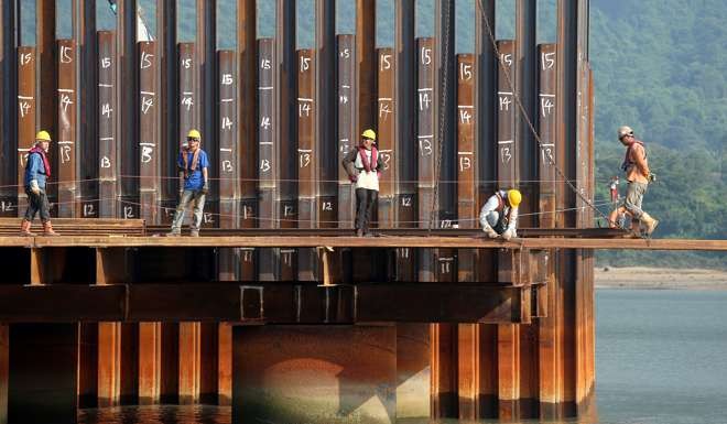 Workers seen at the Hong Kong-Zhuhai-Macau Bridge construction site in 2014. Photo: K.Y. Cheng