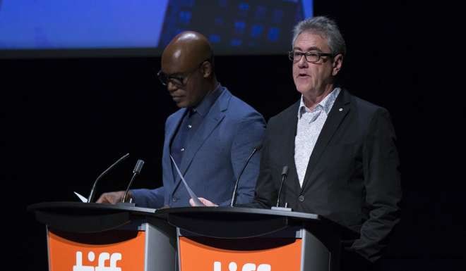 Toronto International Film Festival director Piers Handling (right) announces the winners. Photo: Xinhua