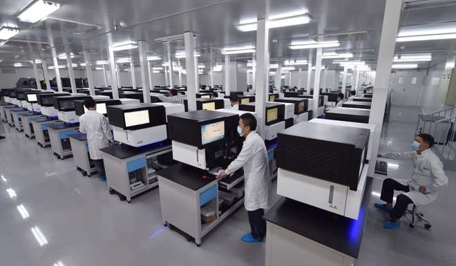 The facility includes 150 domestically developed desktop gene sequencing machines. Photo: Xinhua